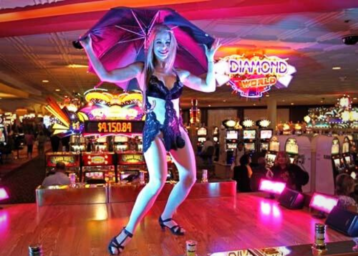 A Bevertainer at the Rio dances on a stage in the casino.