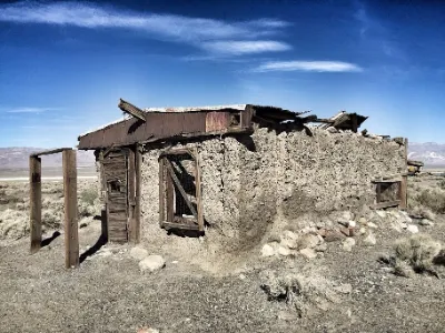 This is a picture of an old abandoned brick building in Ballarat Ghost Town Mojave Desert California