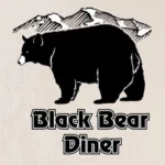 Black Bear Diner photo of mountains behind a big bear