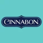 A square Cinnabon LOGO with a green background