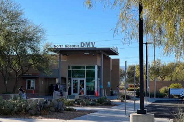 This is an exterior daytime photo of the entrance to the North Decatur Blvd Nevada DMV located at 7170 N Decatur Blvd Las Vegas NV 89131