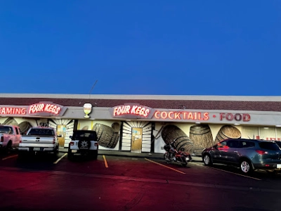 An exterior photo of the Four Kegs Gaming Cocktails and Food dive bar