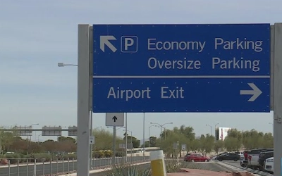 This is a directional sign for the oversize Parking lot at the Las Vegas Airport