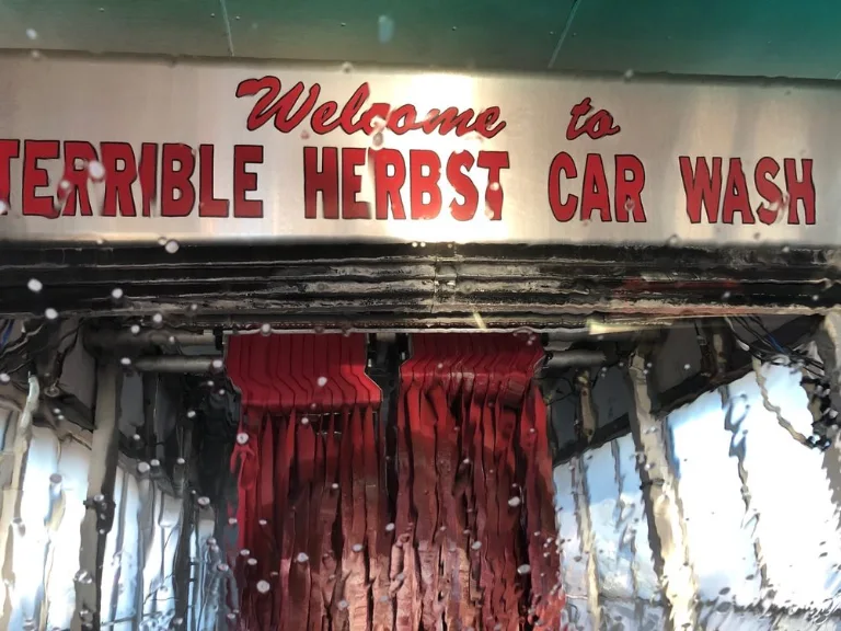 A sign says Welcome to Terrible Herbst Car Wash