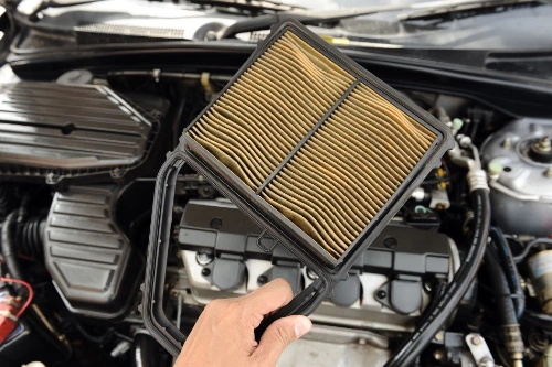 A very dirty car air filter