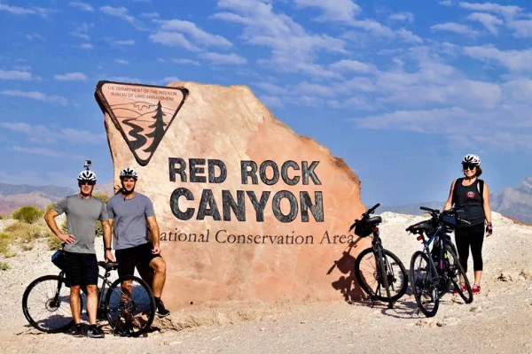 EzRide Las Vegas Red Rock Canyon discount E-Bike Tours - three people ride e-bikes in the mountains.